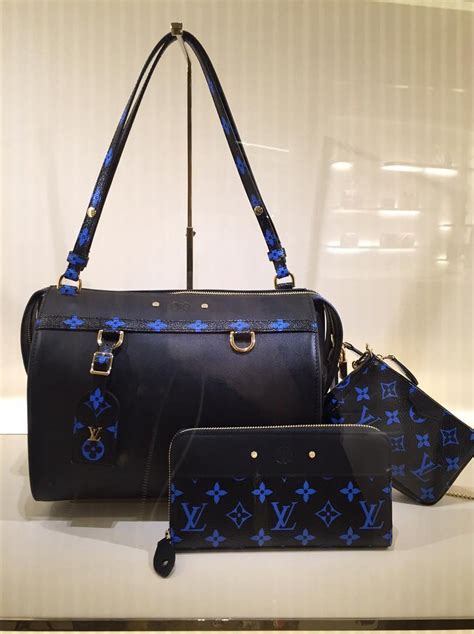 white and blue louis vuitton bag